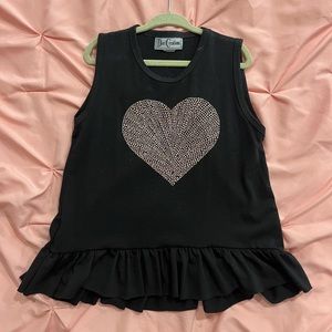 Adorable, rhinestone and ruffled bottom top